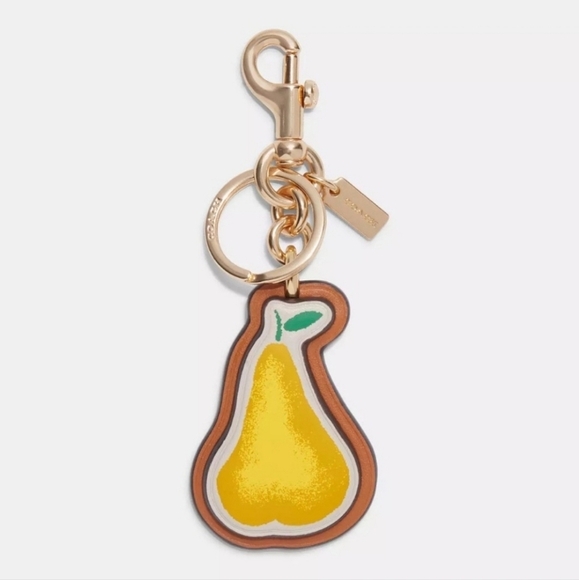 🔹️Coach🔹️ Pear Bag Charm In Signature Canvas Style ✨️🍐 - Picture 1 of 3